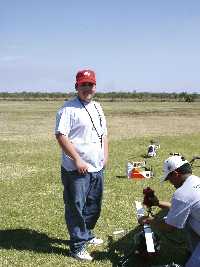 Jason Adamo (standing) at Fun Fly, a radio-controlled helicopter event in Florida.
