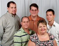 Genetic testing led to an explanation for Jason Adamo’s cardiac and orthopedic problems and to an unexpected diagnosis for his brother Matthew. Back row, from left: Brothers Jason, Matthew and Christopher Adamo. Front row: Louis and Katherine Adamo, parents.